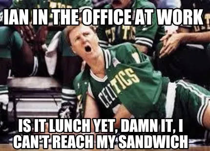 Ian in the office at work Is it lunch yet, damn it, I can't reach my sandwich