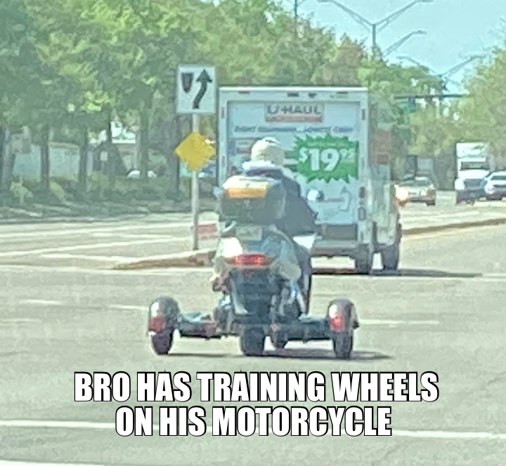 BRO HAS TRAINING WHEELS ON HIS MOTORCYCLE